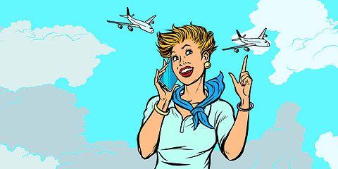 Image showing woman stewardess with phone, sky and planes