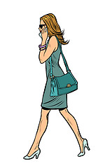 Image showing woman in dress, talking on the phone