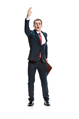 Image showing Choose me. Full body view of businessman on white studio background