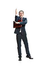 Image showing Choose me. Full body view of businessman on white studio background