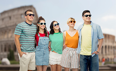 Image showing friends in sunglasses over coliseum background