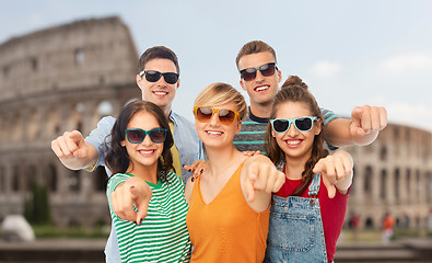 Image showing friends in shades pointing at you over coliseum