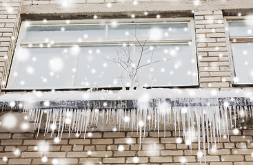 Image showing icicles on building or living house facade