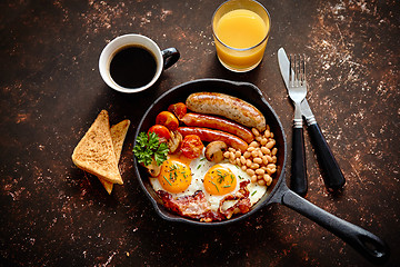 Image showing Delicious english breakfast in iron cooking pan