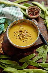 Image showing Green pea cream soup in grey bowl