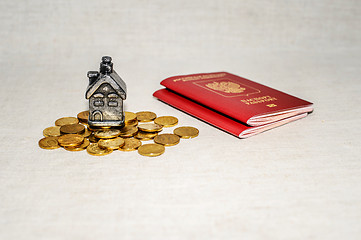 Image showing Passport, money and home - the concept of buying a property