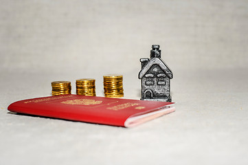 Image showing Passport, money and home - the concept of buying a property