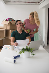 Image showing Young couple moving in a new home