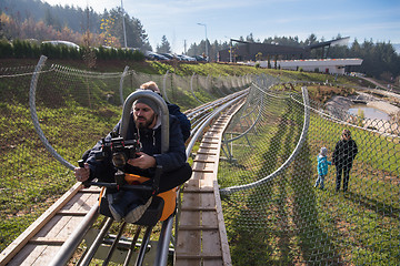 Image showing videographer at work on alpine coaster