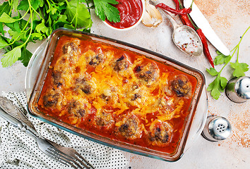 Image showing baked meatballs with sauce