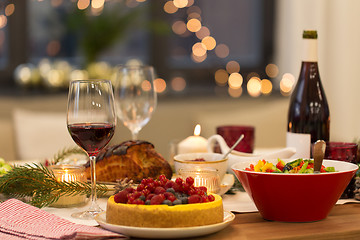 Image showing food and drinks on christmas table at home