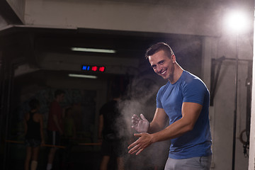 Image showing Gym Chalk Magnesium Carbonate hands clapping man