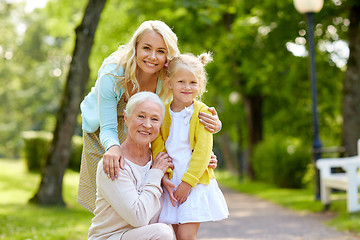 Image showing happy mother, daughter and grandmother at park