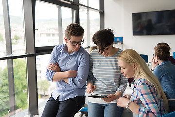 Image showing group of Business People Working With Tablet in startup office