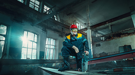 Image showing Portrait senior welder worker on manufacture workshop background