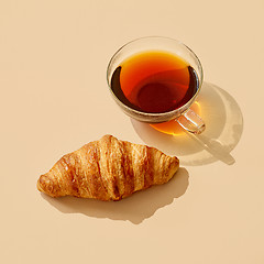 Image showing cup of tea with long shadow