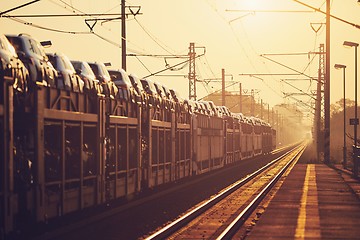 Image showing Freight train at sunrise