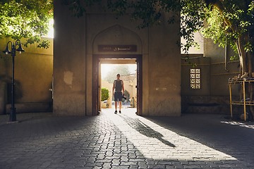 Image showing Silhouette of young tourist