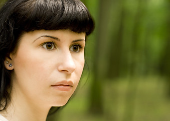 Image showing scared girl in forest