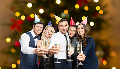 Image showing friends with champagne glasses at christmas party