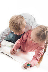 Image showing Little girl and boy painting