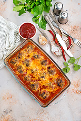 Image showing baked meatballs with sauce