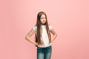 Image showing Young serious thoughtful teen girl. Doubt concept.