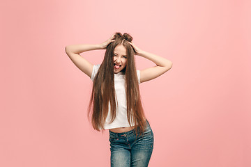 Image showing The squint eyed teen girl with weird expression