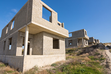 Image showing Abandoned construction of several cottages