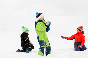 Image showing happy little kids playing outdoors in winter