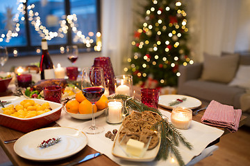 Image showing food and drinks on christmas table at home