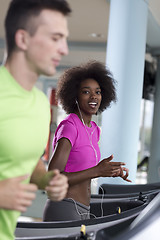 Image showing people exercisinng a cardio on treadmill