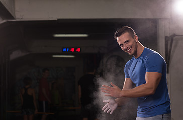 Image showing Gym Chalk Magnesium Carbonate hands clapping man