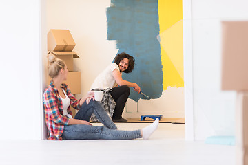 Image showing young couple doing home renovations