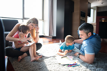 Image showing young couple spending time with kids