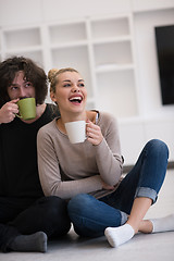 Image showing young couple in their new home