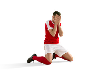 Image showing unhappy soccer or football player with palm on his face