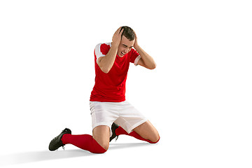 Image showing unhappy soccer or football player with palm on his face