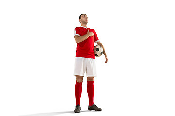 Image showing Professional football soccer player with ball isolated white background