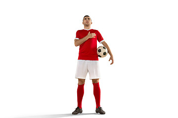 Image showing Professional football soccer player with ball isolated white background