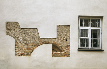 Image showing Plastered wall with remains of old stonework