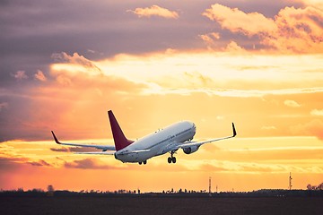 Image showing Take off at the sunset