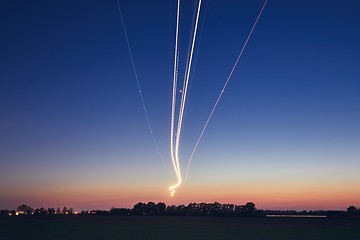 Image showing Light trails of airplane during landing