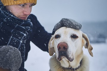 Image showing Friendship between pet owner and his dog