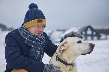 Image showing Friendship between pet owner and his dog