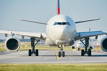 Image showing Sunny day at busy airport