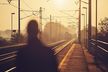 Image showing Man waiting at railroad station