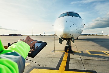 Image showing Preparations of passenger airplane at the airport