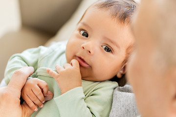 Image showing close up of sweet little baby boy with parent