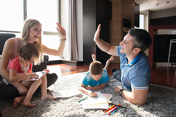 Image showing young couple spending time with kids